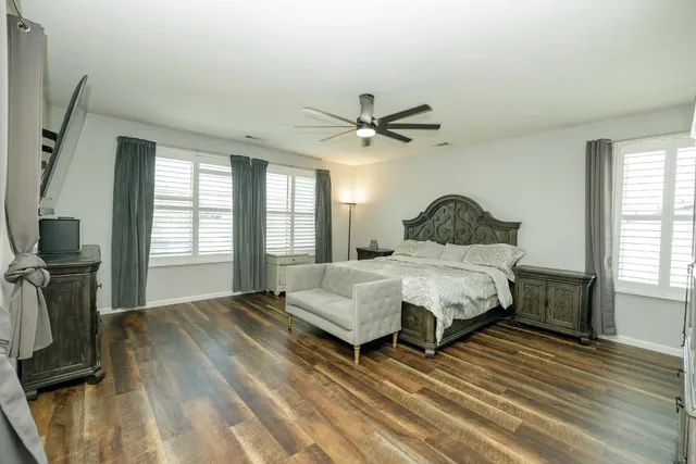 a view of a house with a backyard