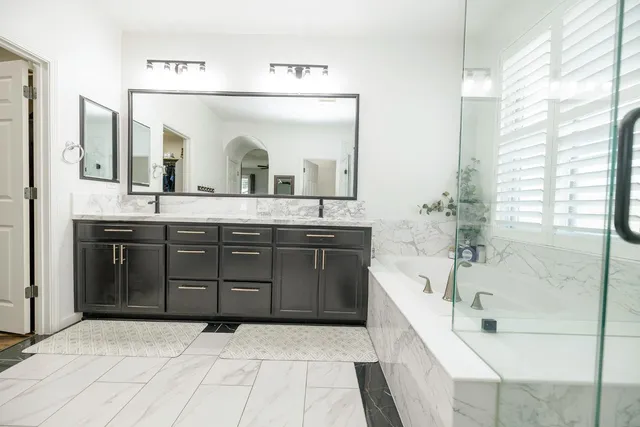 an aerial view of residential house with outdoor space and swimming pool