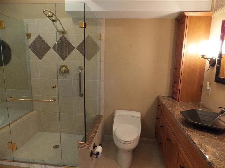 14 Brick Hill Road Orleans, MA 02653 - Photo 11 of 27 a bathroom with a granite countertop sink a toilet and shower