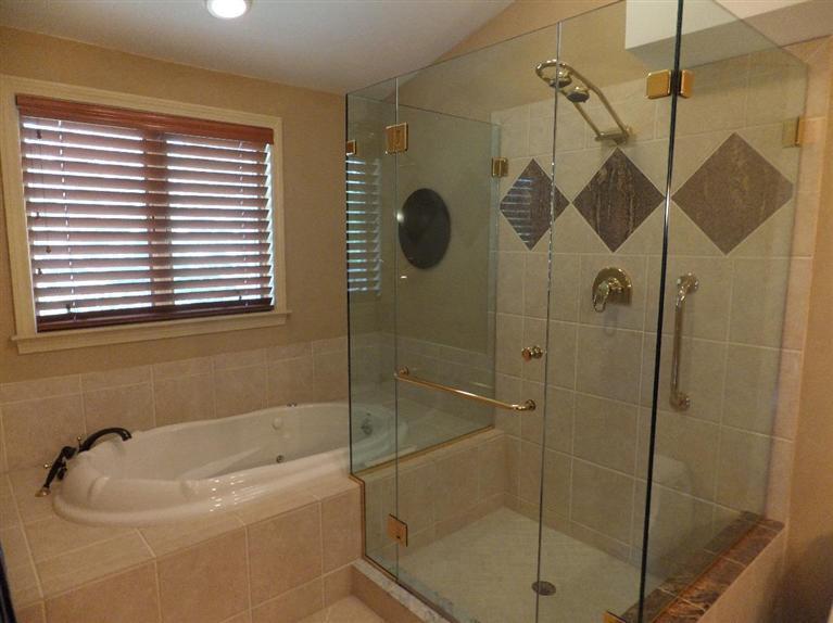 14 Brick Hill Road Orleans, MA 02653 - Photo 14 of 27 a bathroom with a bath tub with a shower