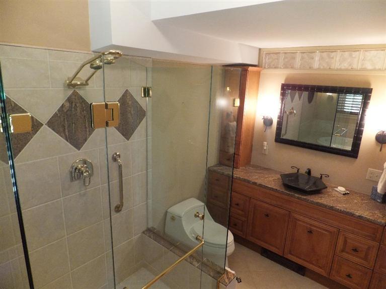 14 Brick Hill Road Orleans, MA 02653 - Photo 15 of 27 a bathroom with a toilet sink and mirror