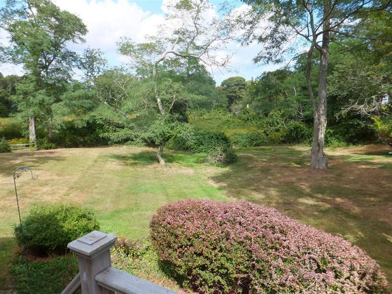 14 Brick Hill Road Orleans, MA 02653 - Photo 24 of 27 a view of a lake with a yard