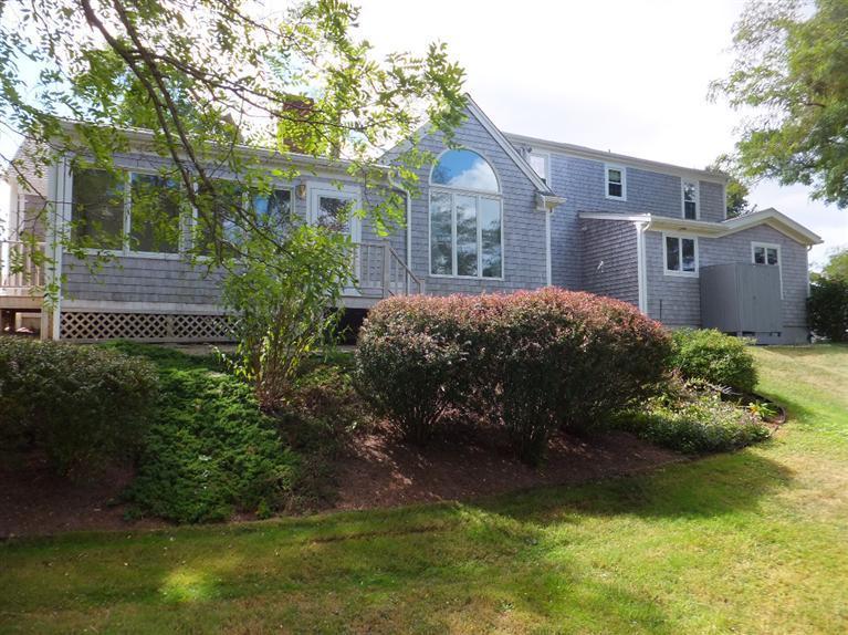14 Brick Hill Road Orleans, MA 02653 - Photo 27 of 27 a view of a house with a garden