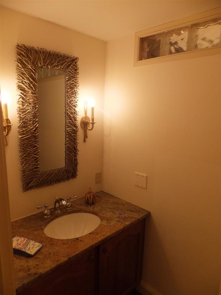 14 Brick Hill Road Orleans, MA 02653 - Photo 10 of 27 a bathroom with a sink and a mirror
