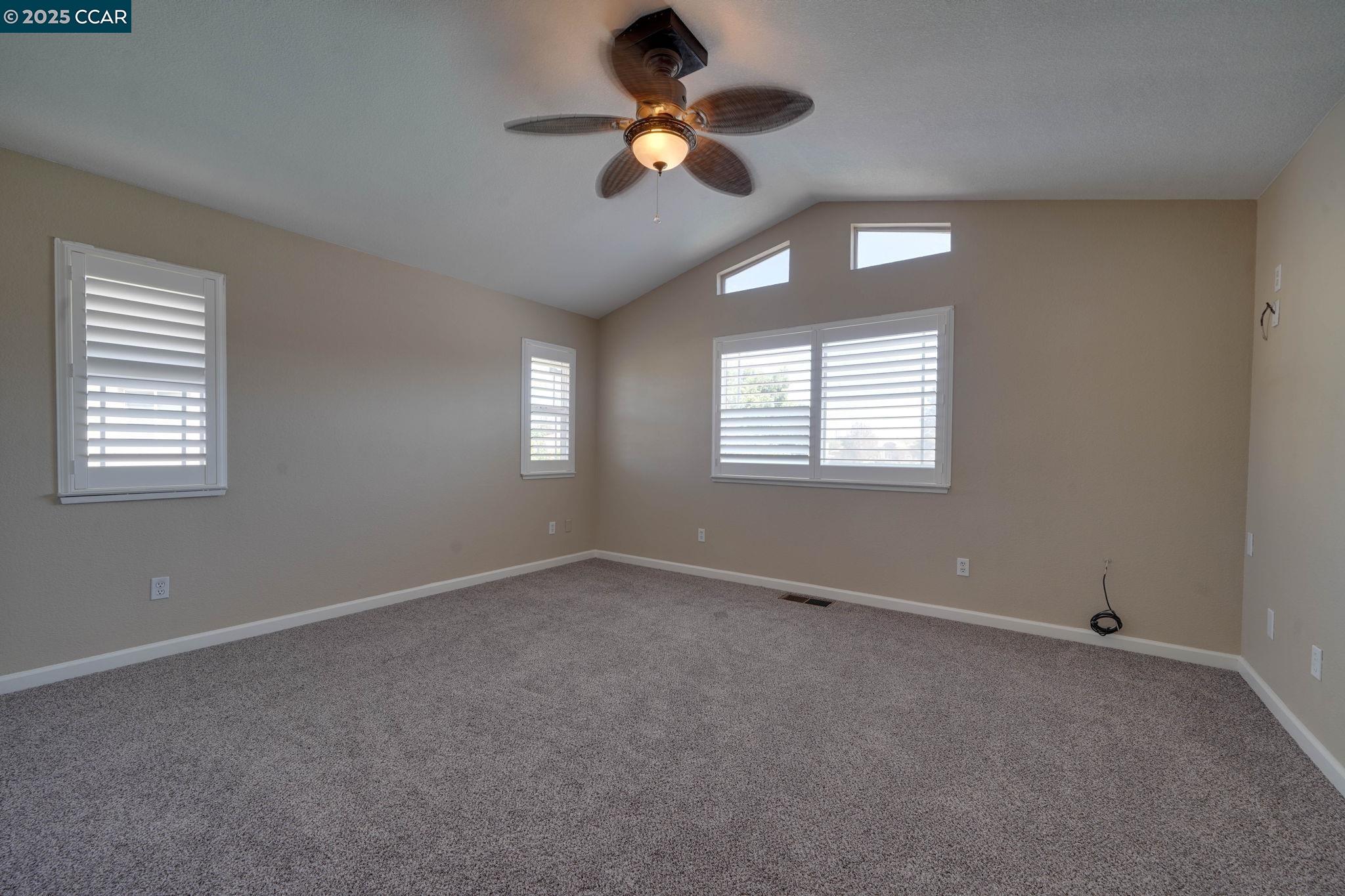 1210 Snow Ridge Court Modesto, CA 95351 - Photo 26 of 43 a view of an empty room with a window