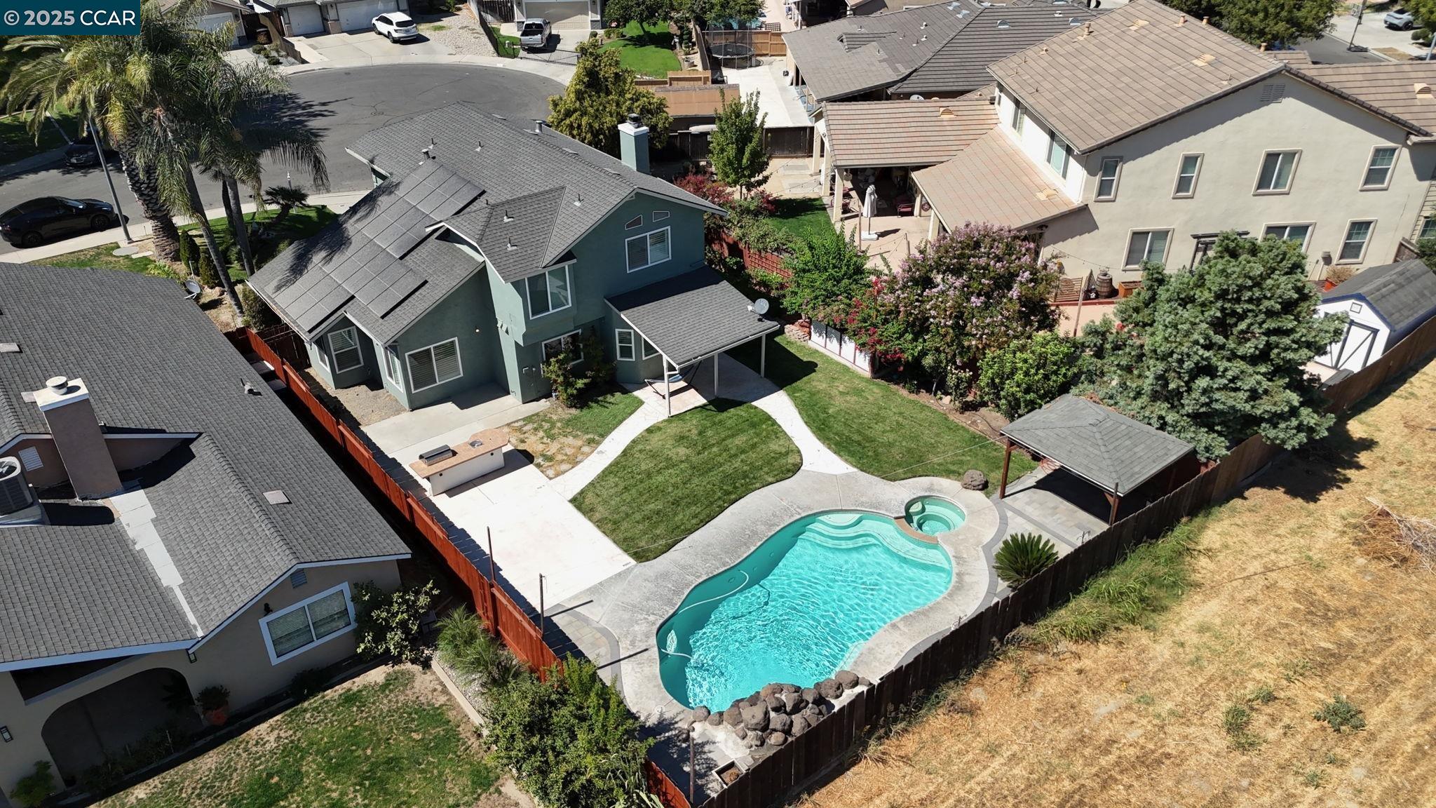 1210 Snow Ridge Court Modesto, CA 95351 - Photo 39 of 43 an aerial view of a house with a yard