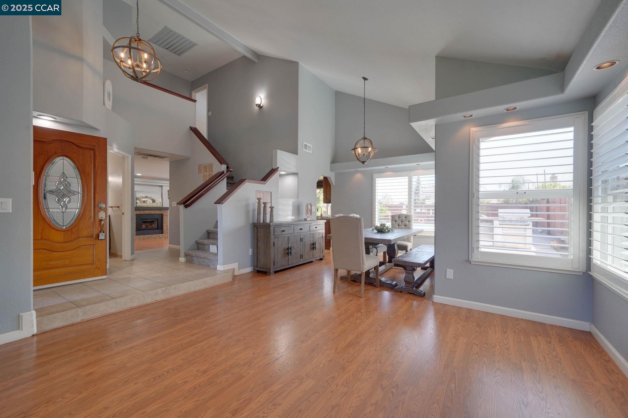 1210 Snow Ridge Court Modesto, CA 95351 - Photo 6 of 43 a living room with furniture and a table