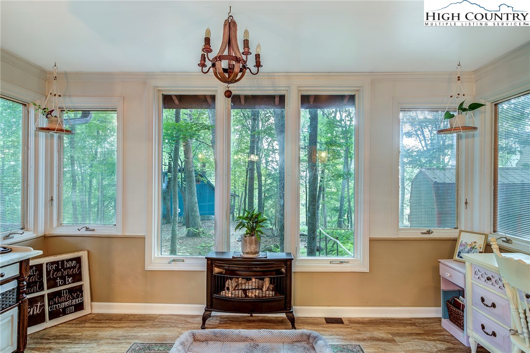 528 Bear Ridge Trail Fleetwood, NC 28626 - Photo 25 of 44 a room with furniture and window