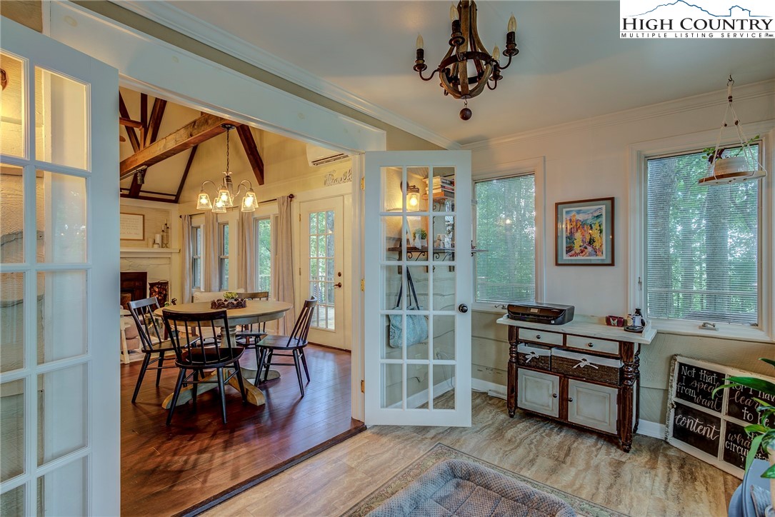 528 Bear Ridge Trail Fleetwood, NC 28626 - Photo 27 of 44 a view of a dining room with furniture window and wooden floor