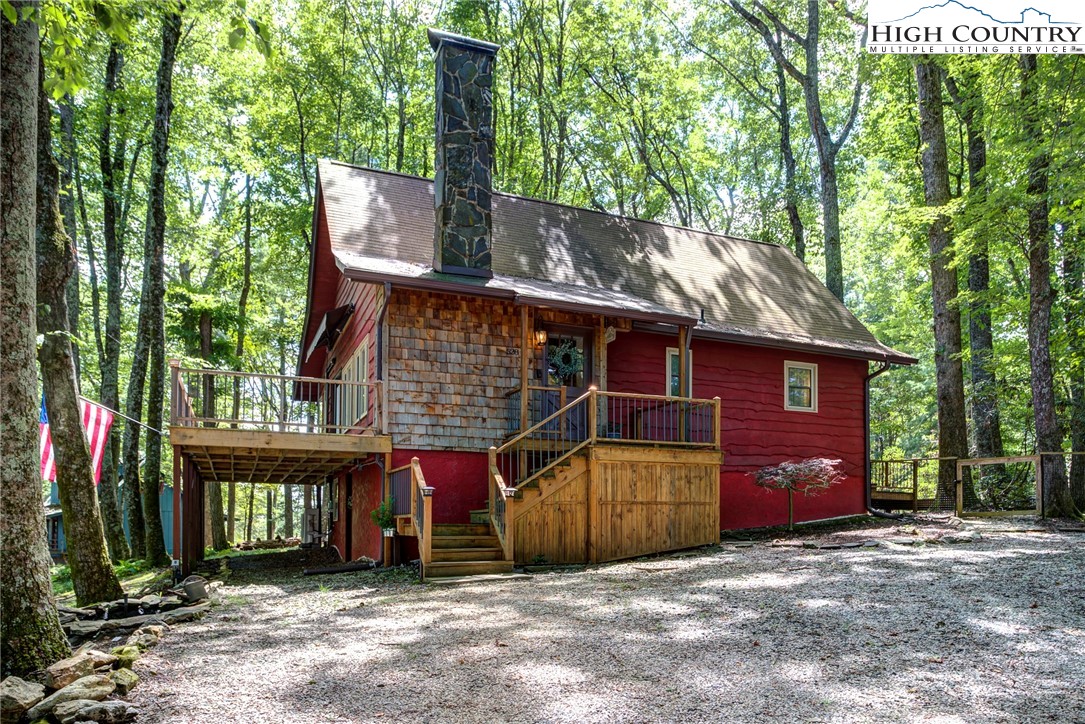 528 Bear Ridge Trail Fleetwood, NC 28626 - Photo 3 of 44 a view of a house with a yard