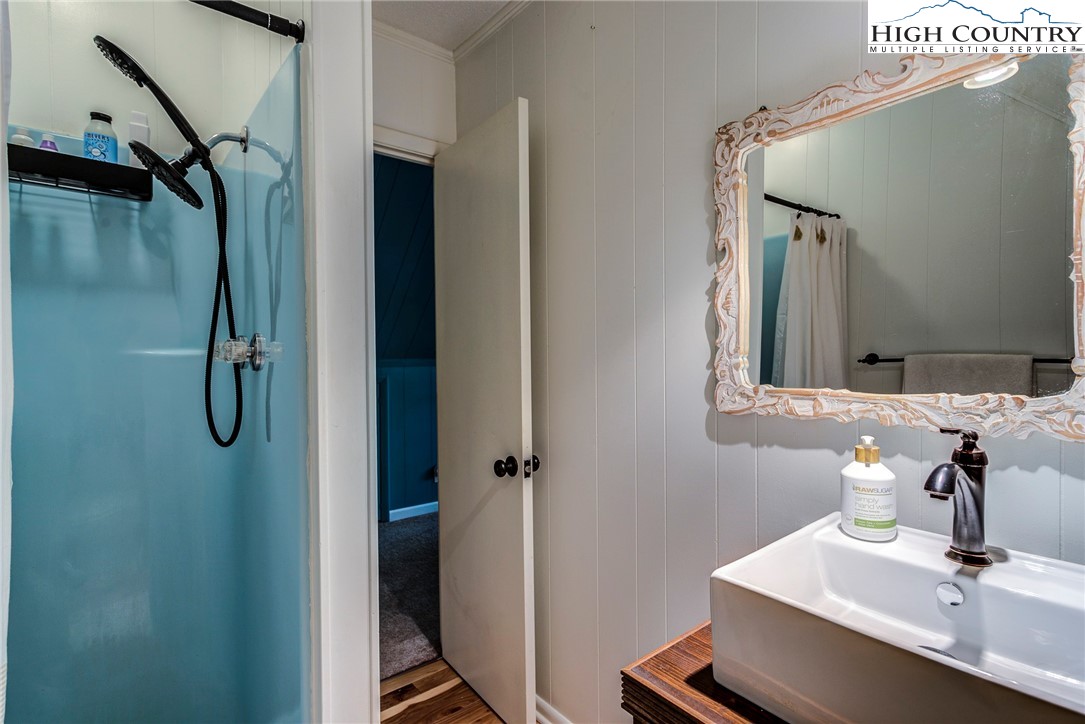 528 Bear Ridge Trail Fleetwood, NC 28626 - Photo 37 of 44 a bathroom with a sink and a mirror