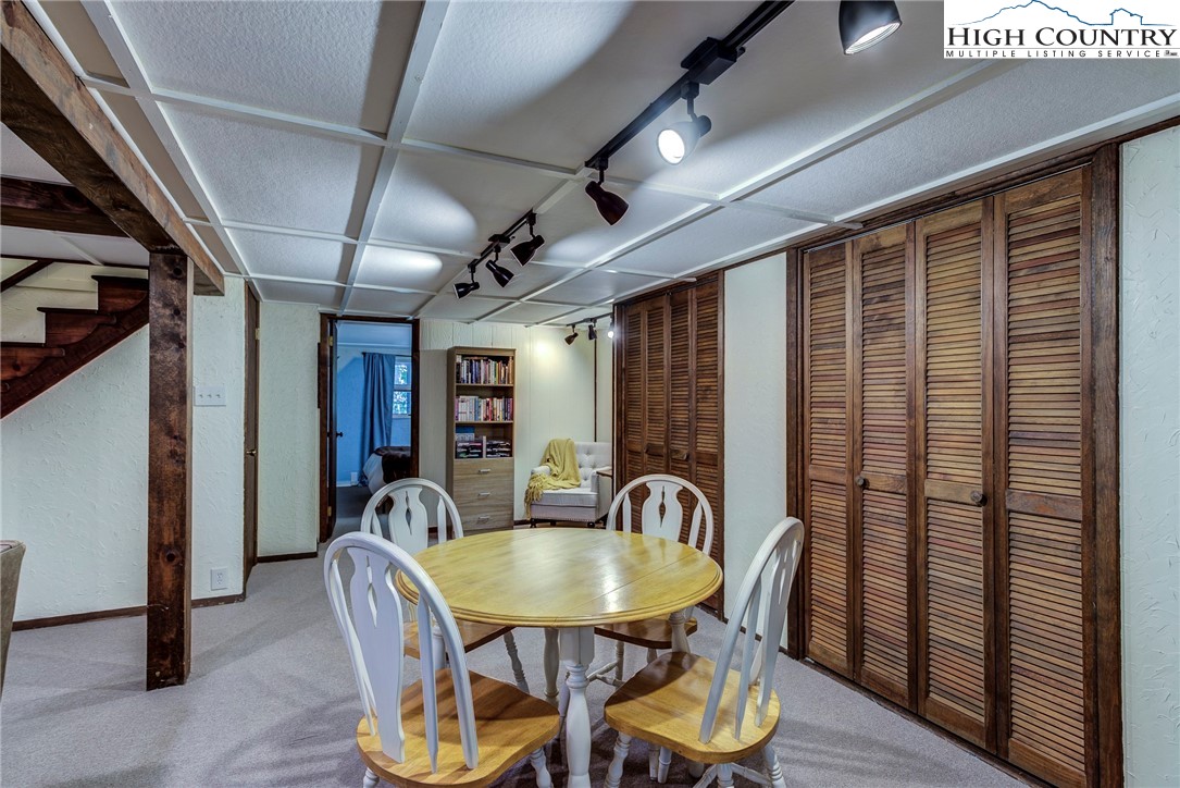 528 Bear Ridge Trail Fleetwood, NC 28626 - Photo 41 of 44 a dining room with furniture and wooden floor