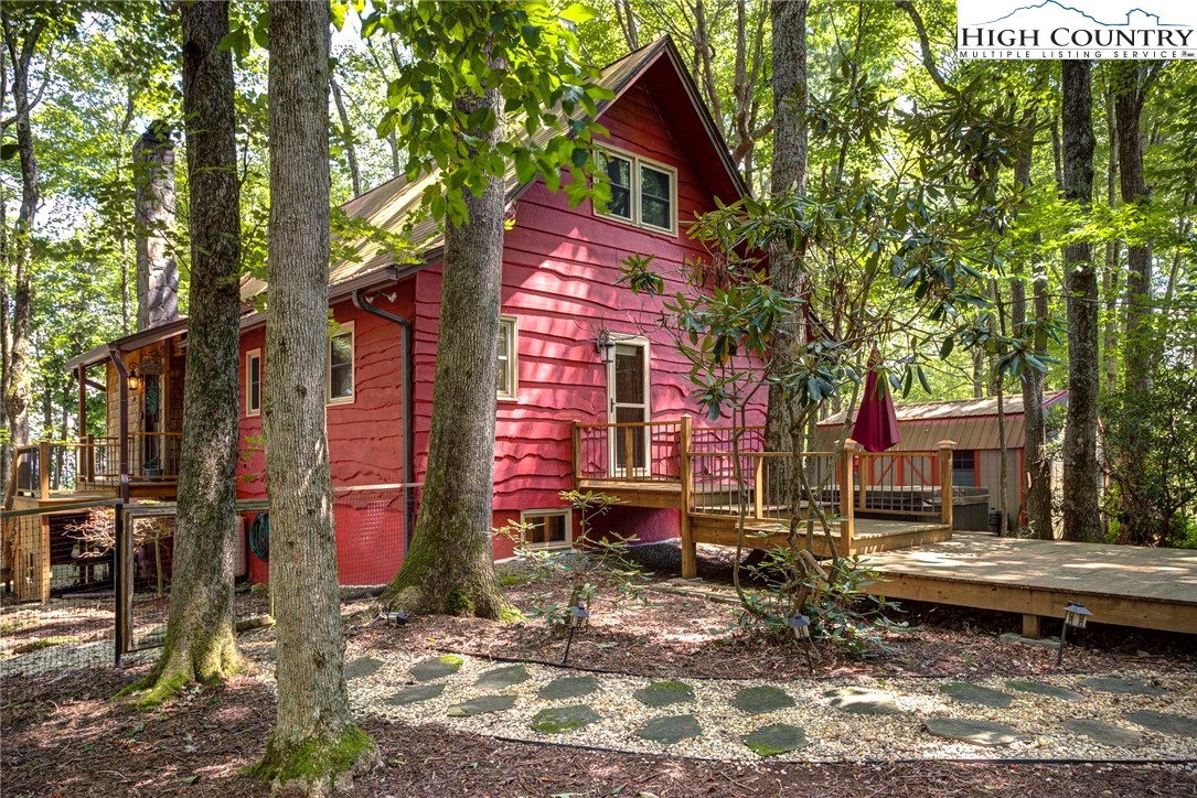 528 Bear Ridge Trail Fleetwood, NC 28626 - Photo 6 of 44 a front view of a house with a yard