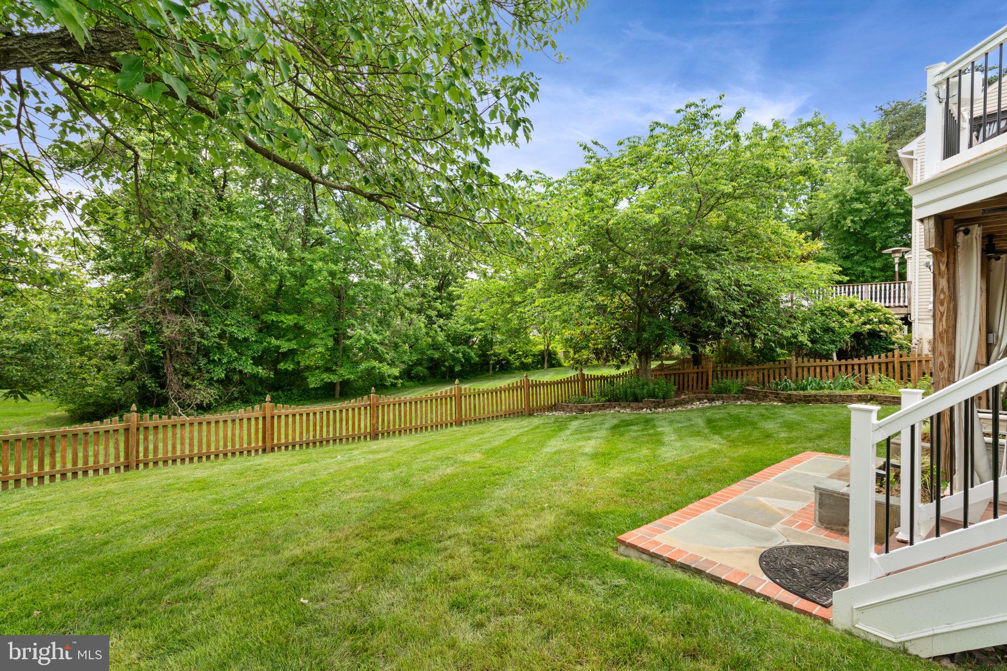 8527 Silverview Drive Lorton, VA 22079 - Photo 3 of 63 a view of a backyard with a garden and plants