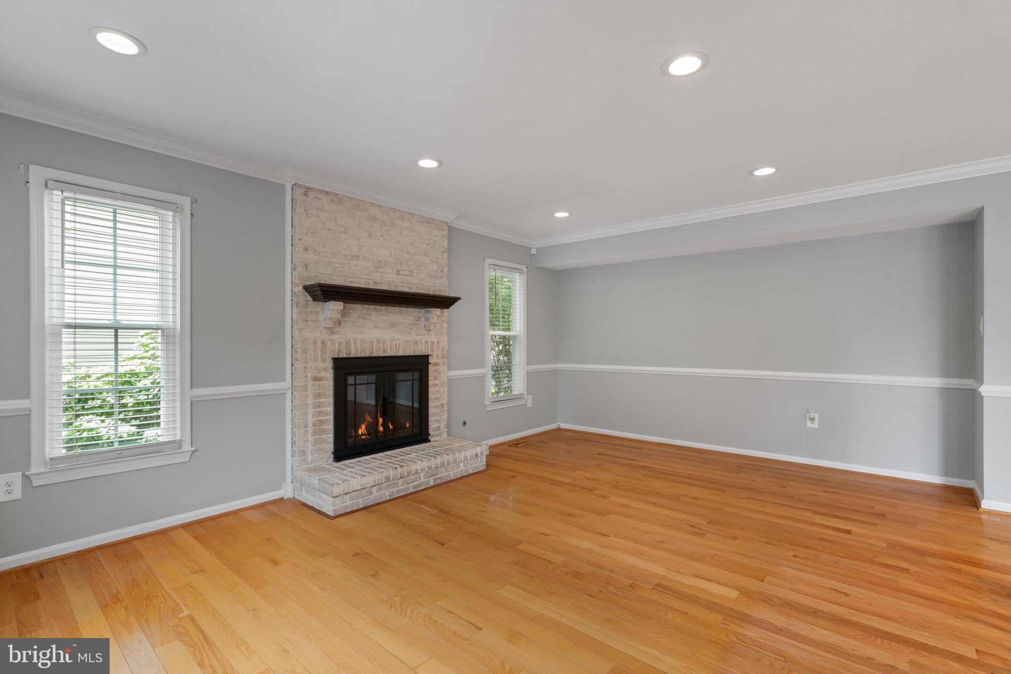 8527 Silverview Drive Lorton, VA 22079 - Photo 47 of 63 a view of an empty room with a fireplace and a window