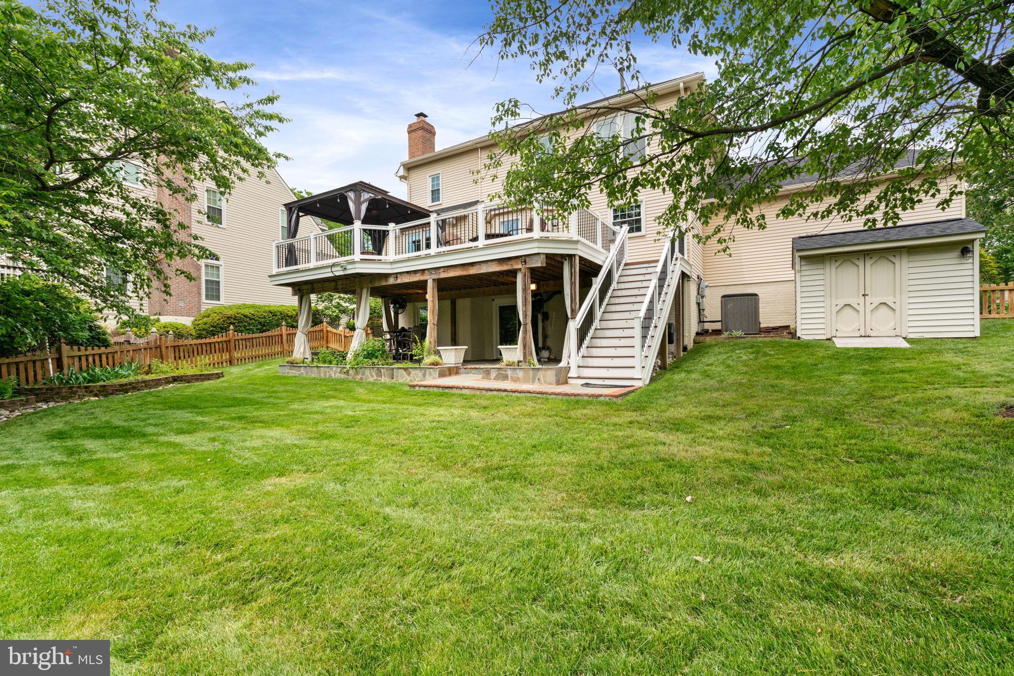 8527 Silverview Drive Lorton, VA 22079 - Photo 5 of 63 a front view of a house with a yard