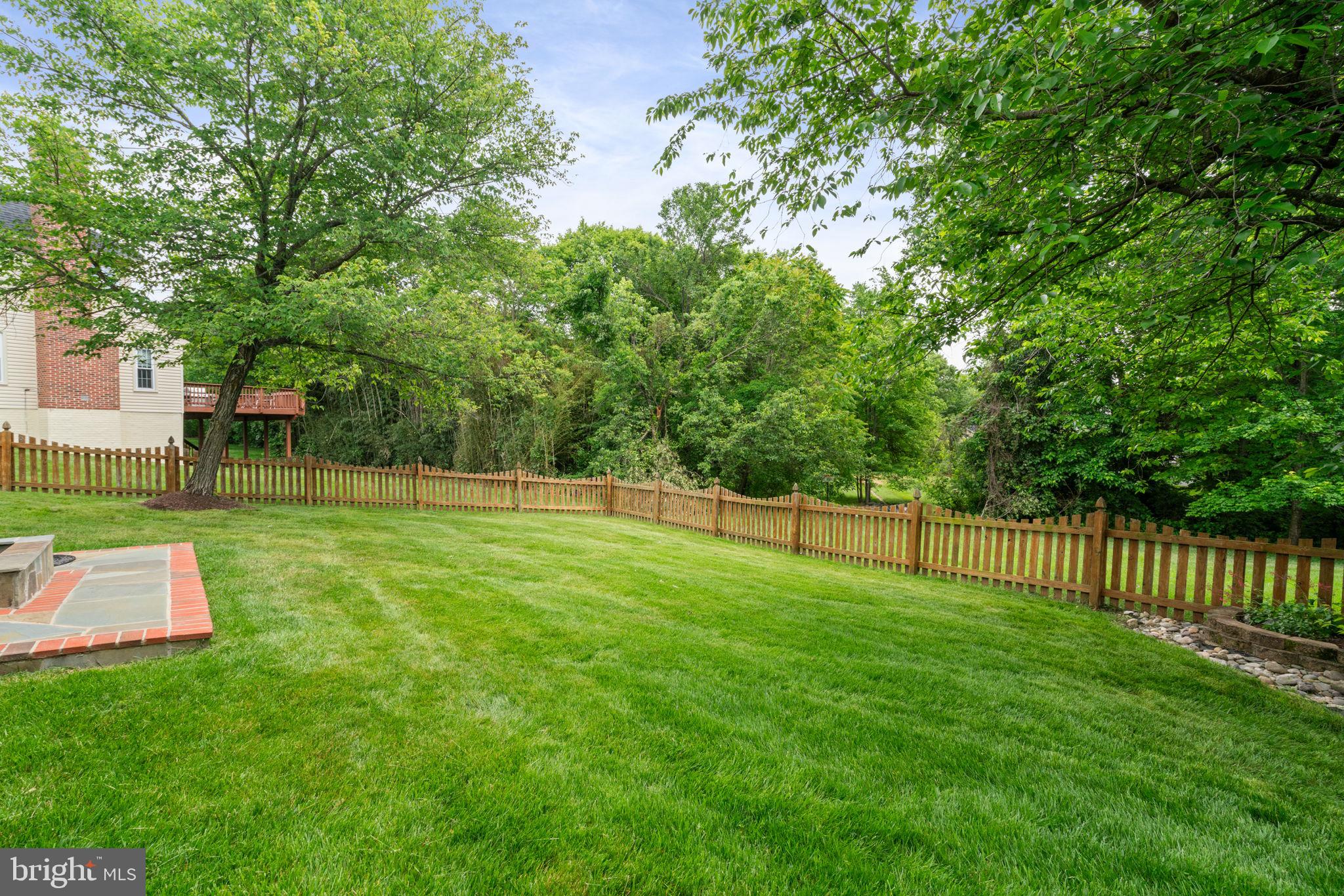 8527 Silverview Drive Lorton, VA 22079 - Photo 6 of 63 a view of a backyard with a garden