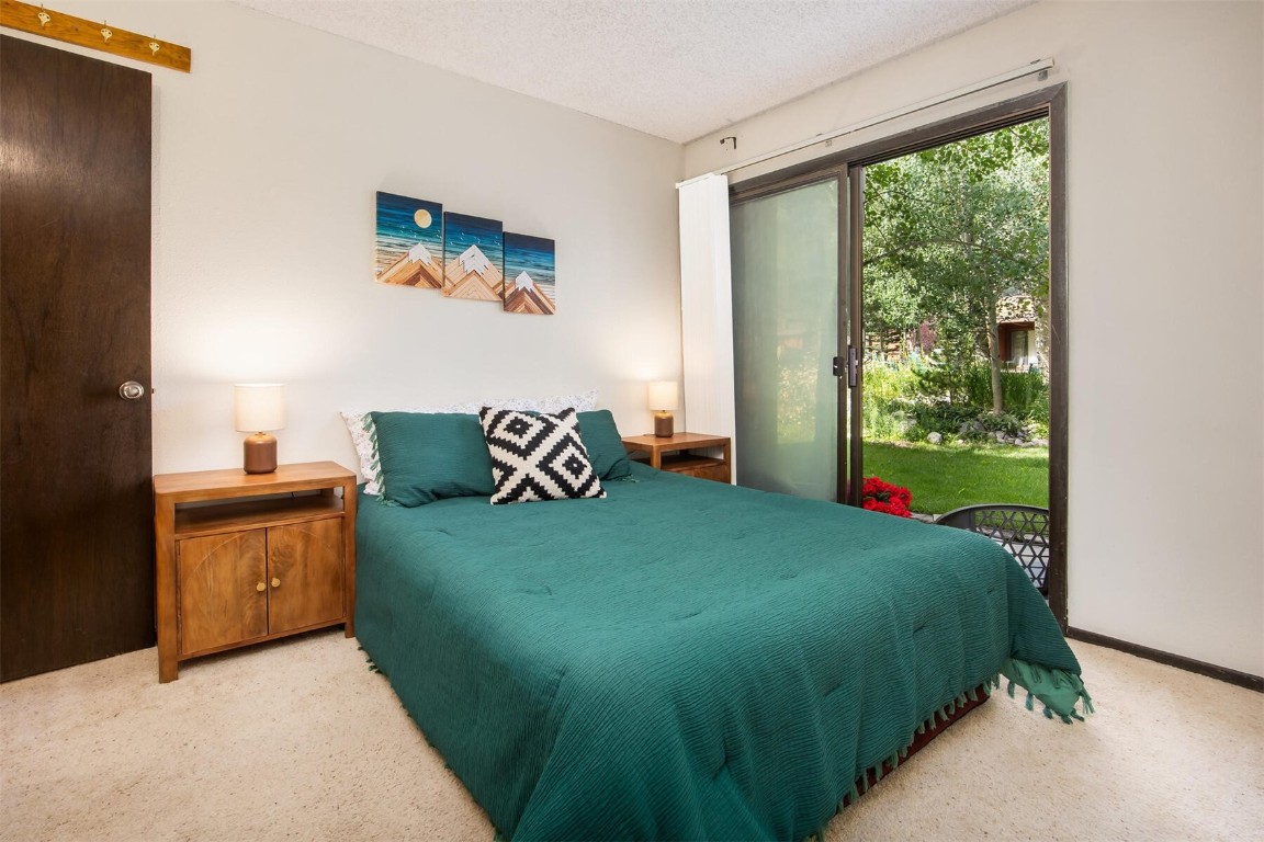 510 Pitkin Street, Unit C4 Frisco, CO 80443 - Photo 20 of 41 a bedroom with a bed and a window