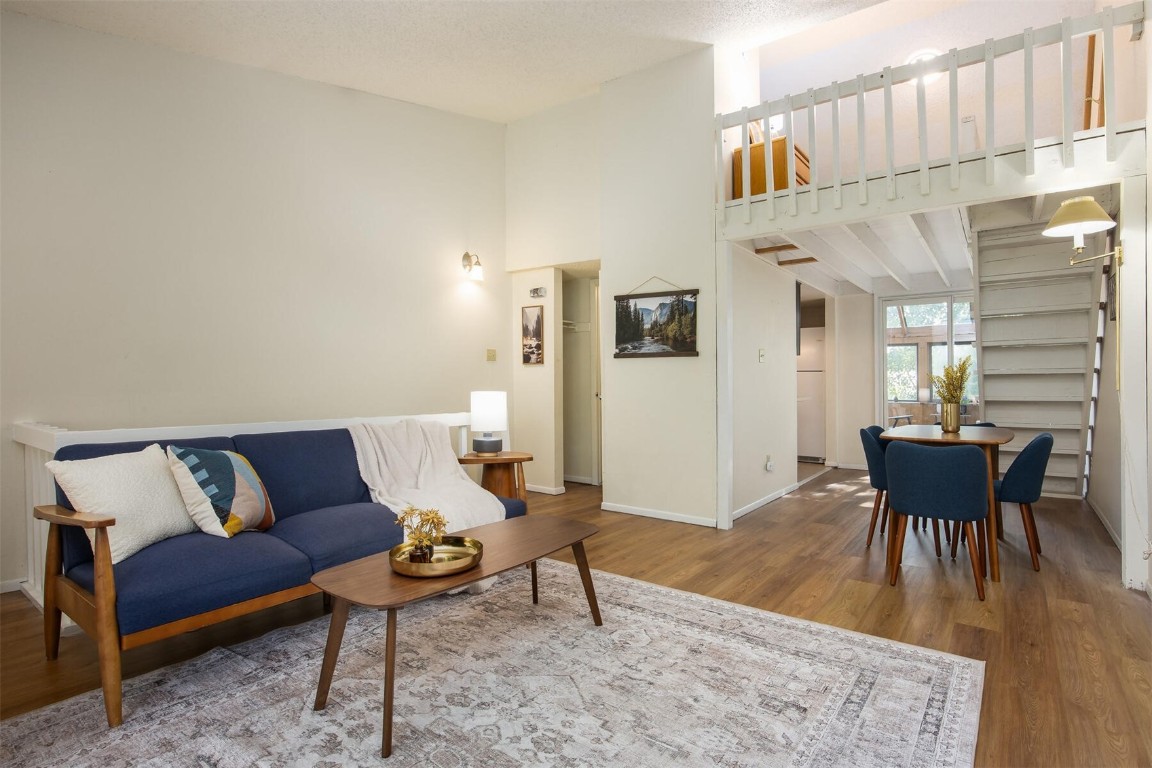 510 Pitkin Street, Unit C4 Frisco, CO 80443 - Photo 2 of 41 a living room with furniture wooden floor and a table