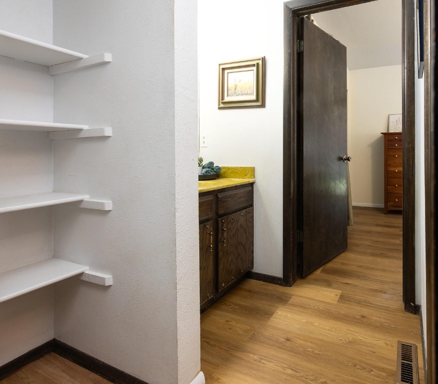 510 Pitkin Street, Unit C4 Frisco, CO 80443 - Photo 23 of 41 a view of a hallway with wooden shelves