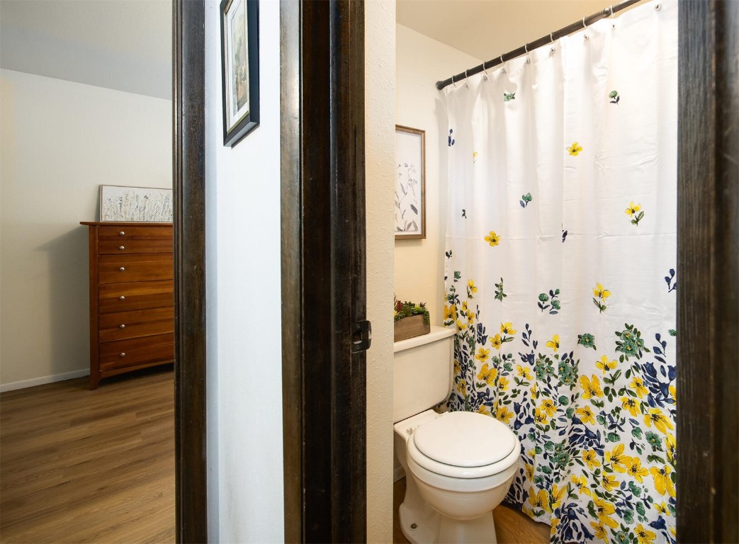 510 Pitkin Street, Unit C4 Frisco, CO 80443 - Photo 25 of 41 a bathroom with a toilet and a shower curtain