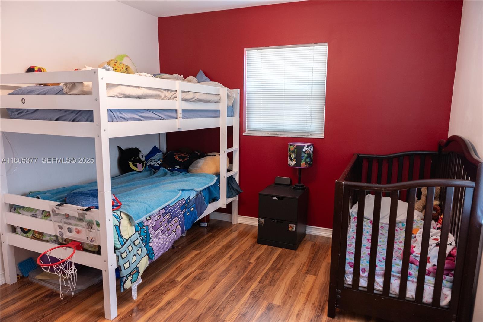 19663 Hampton Drive Boca Raton, FL 33434 - Photo 13 of 33 a bed room with a bed and a tv