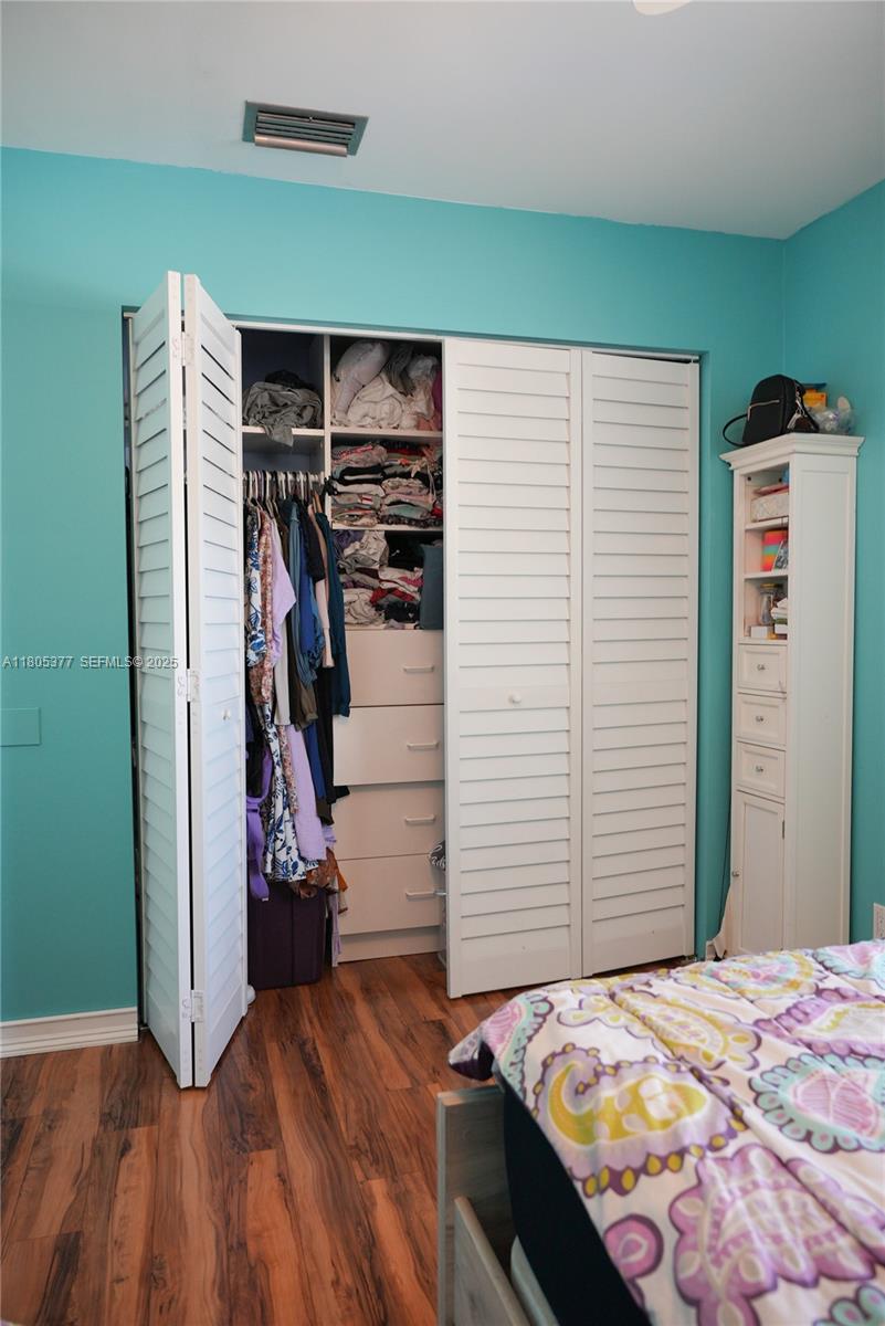 19663 Hampton Drive Boca Raton, FL 33434 - Photo 14 of 33 a view of a livingroom with storage