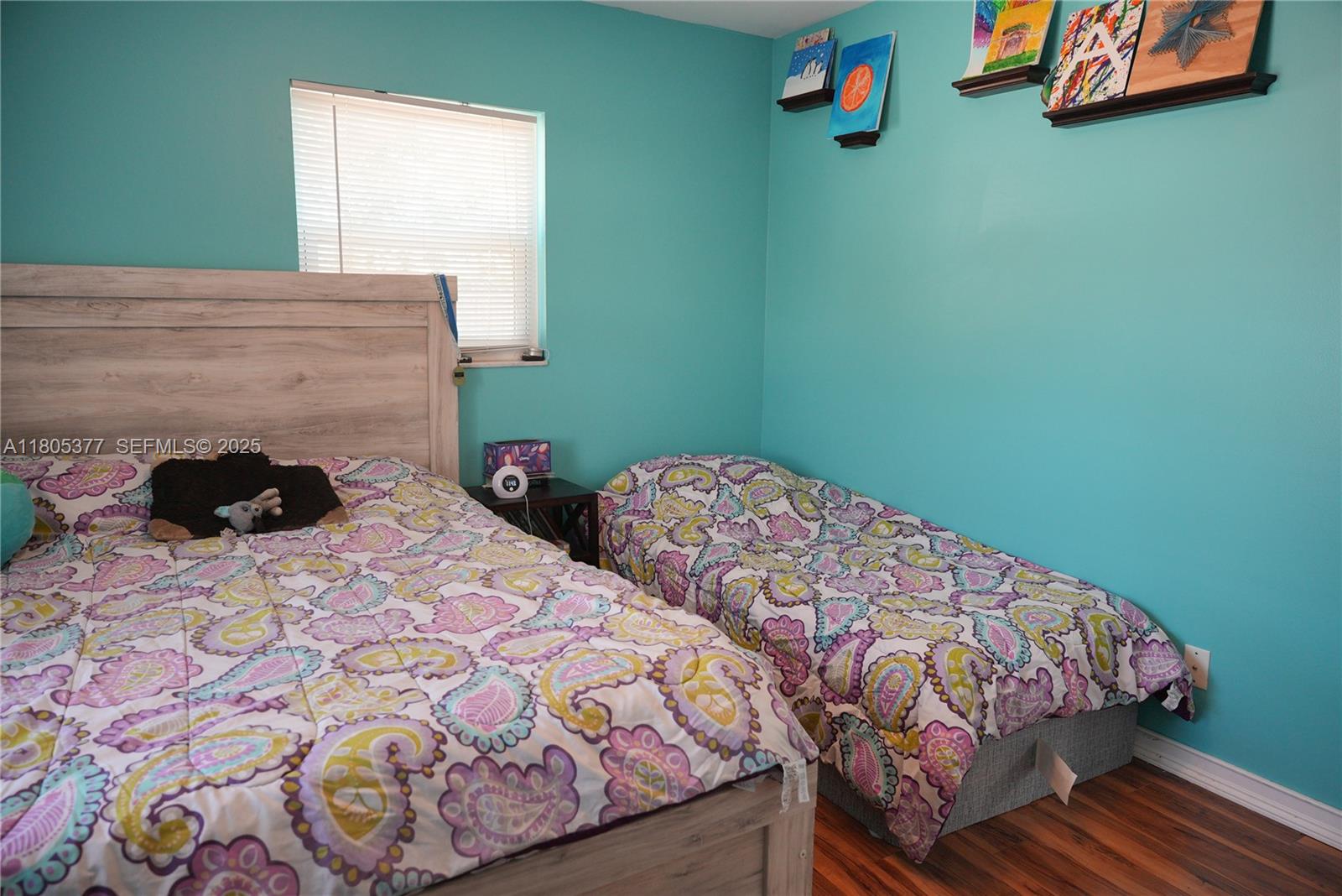 19663 Hampton Drive Boca Raton, FL 33434 - Photo 15 of 33 a bedroom with a bed and dresser