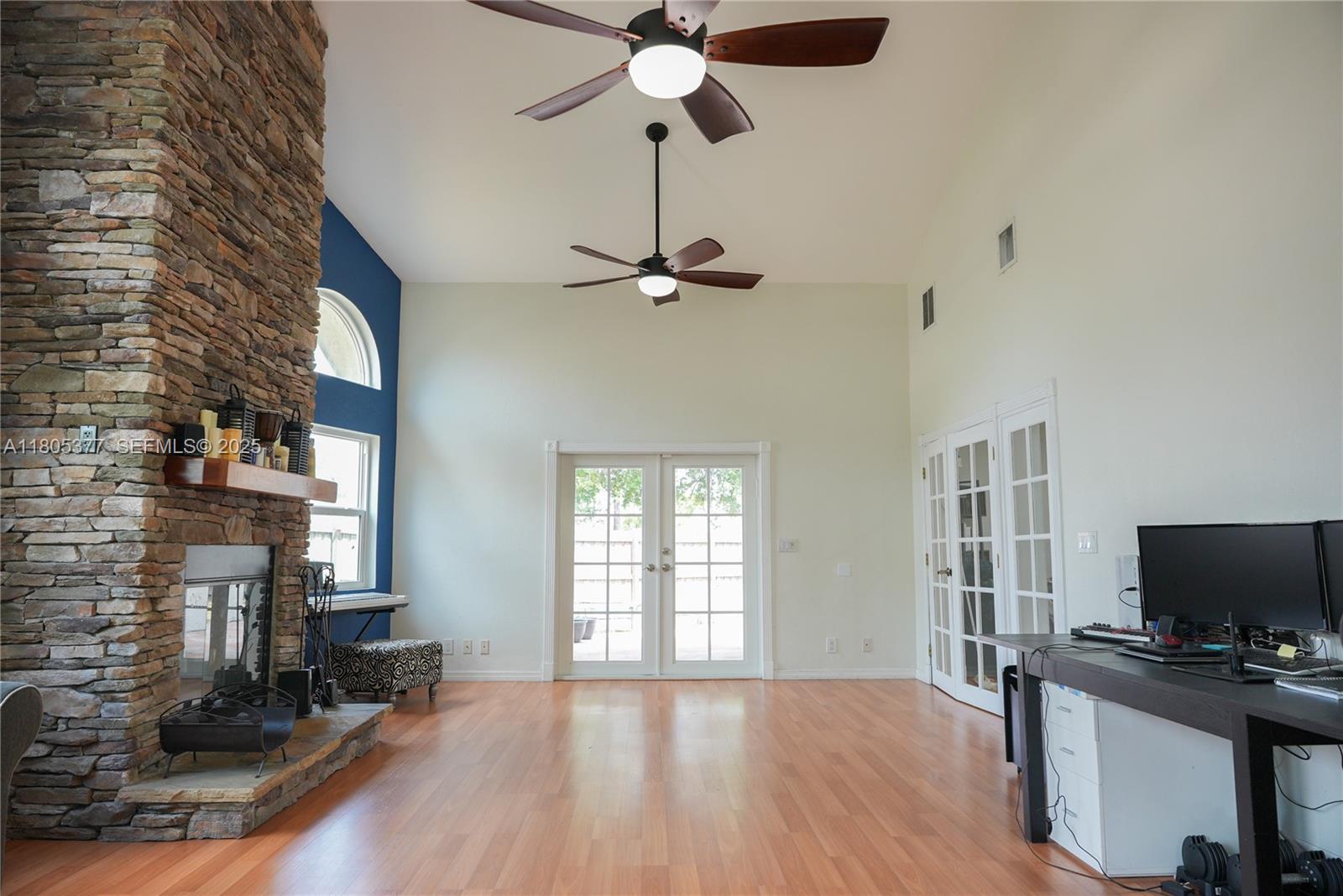 19663 Hampton Drive Boca Raton, FL 33434 - Photo 4 of 33 a living room with furniture and a flat screen tv
