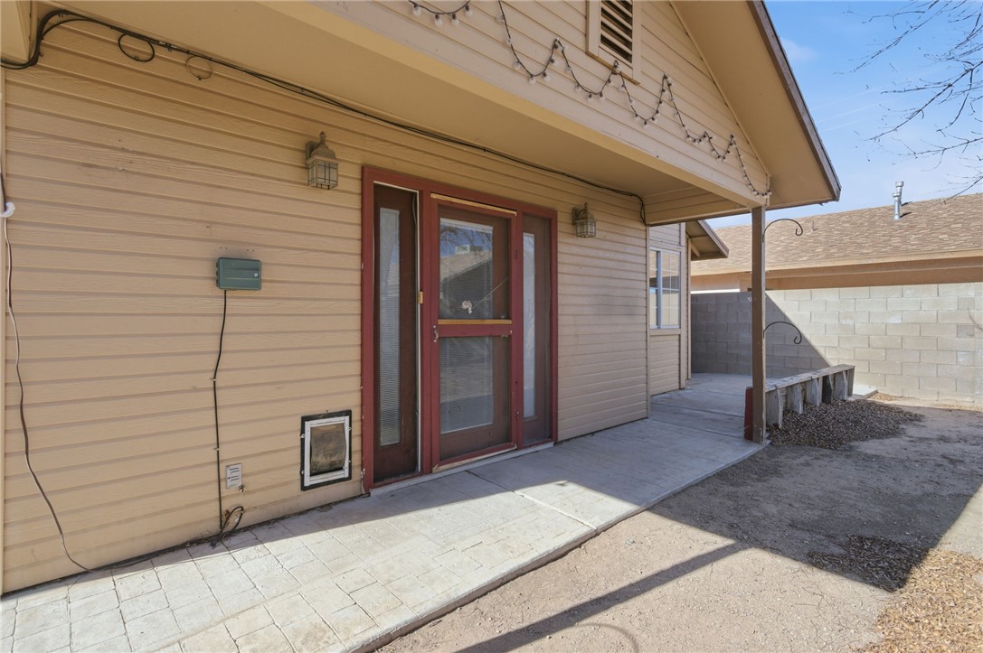 3740 North Kenneth Road Kingman, AZ 86409 - Photo 21 of 26 Entrance to property featuring a patio area