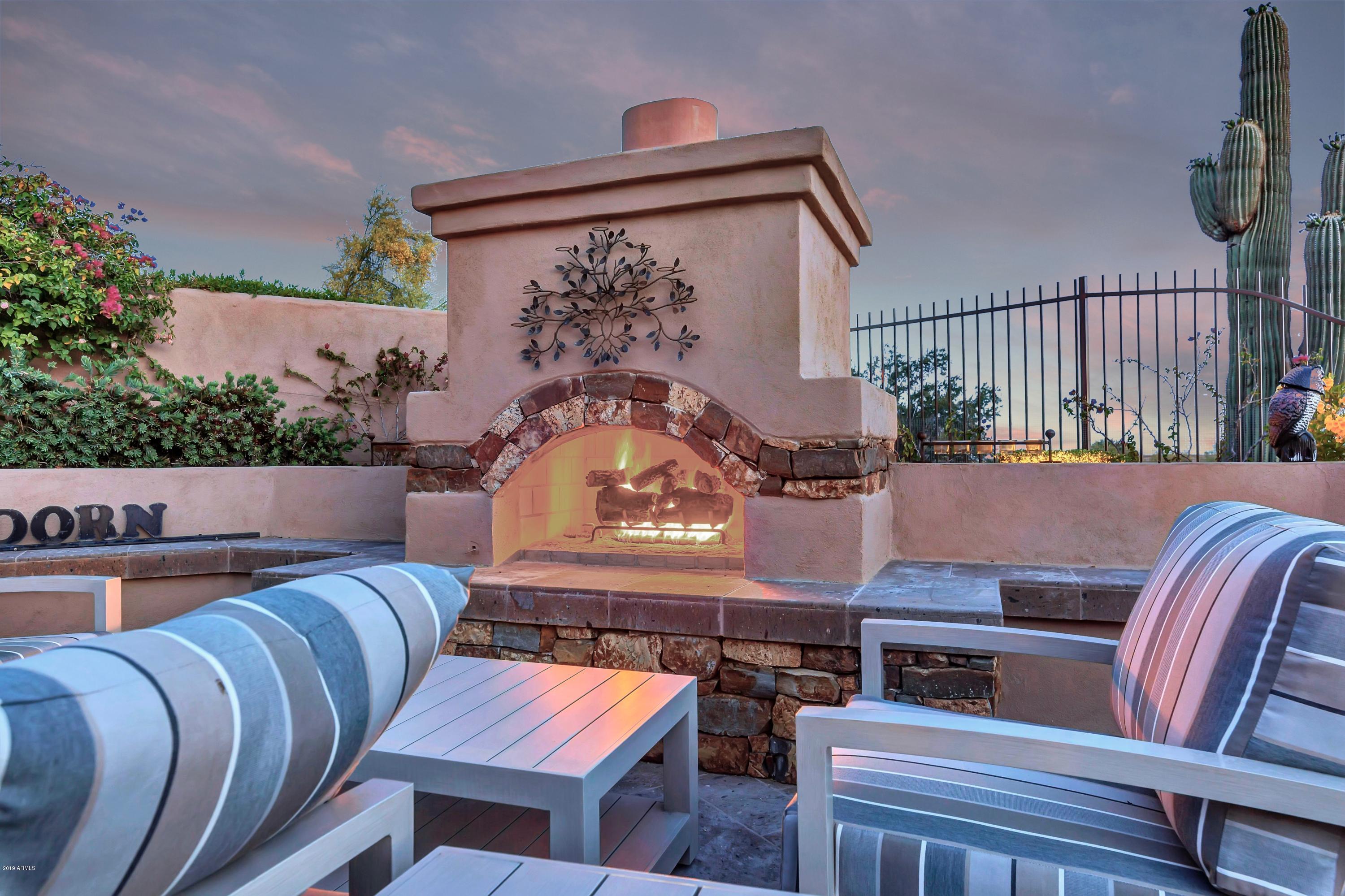9327 East Mountain Spring Road Scottsdale, AZ 85255 - Photo 48 of 63 SITTING AREA WITH FIREPLACE