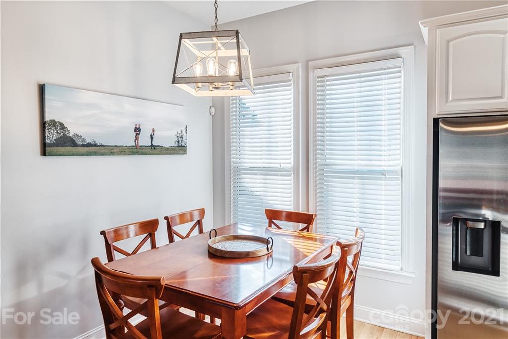 3349 Richard's Crossing Fort Mill, SC 29708 - Photo 15 of 33 a view of a dining room with furniture and chandelier