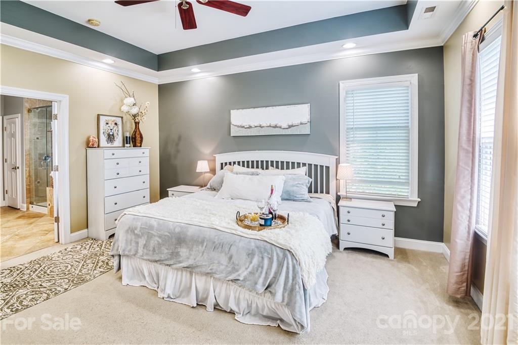 3349 Richard's Crossing Fort Mill, SC 29708 - Photo 21 of 33 a bedroom with a bed and a cabinets