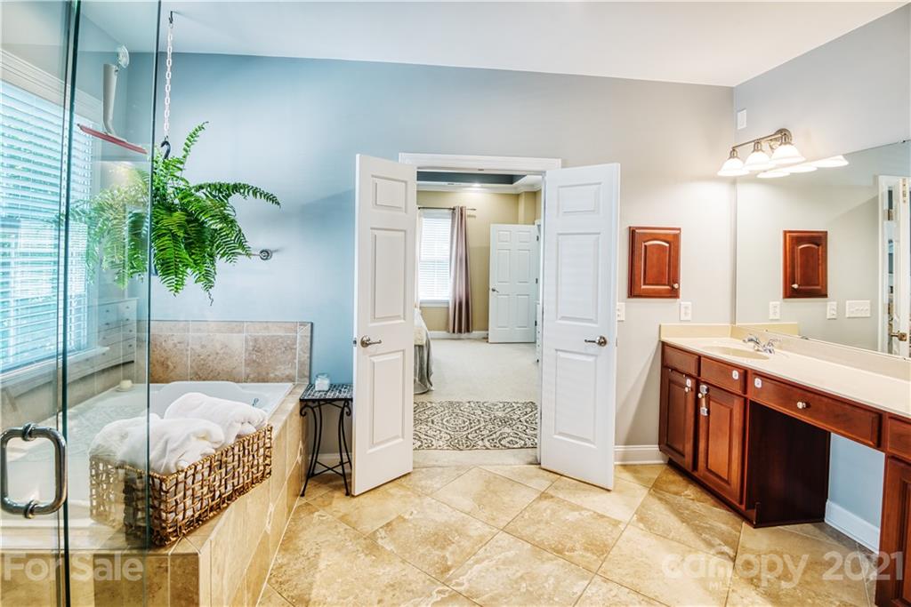3349 Richard's Crossing Fort Mill, SC 29708 - Photo 23 of 33 a spacious bathroom with a double vanity sink and a mirror