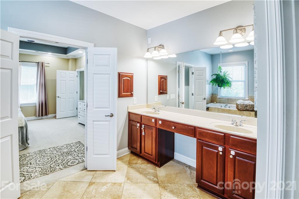 3349 Richard's Crossing Fort Mill, SC 29708 - Photo 24 of 33 a spacious bathroom with a sink and a mirror