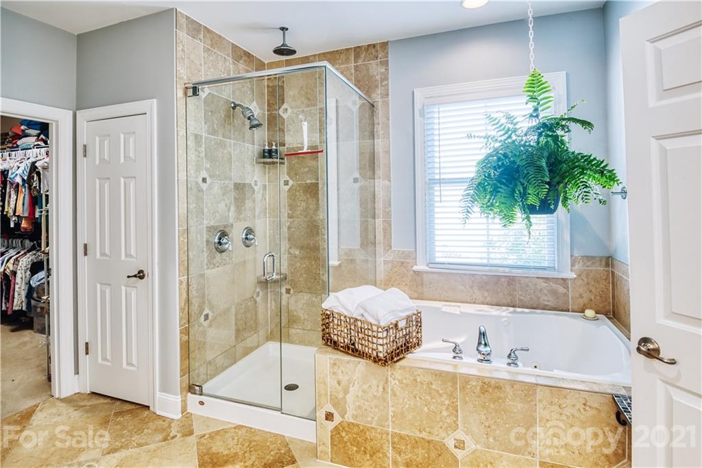 3349 Richard's Crossing Fort Mill, SC 29708 - Photo 25 of 33 a bathroom with a tub shower and window
