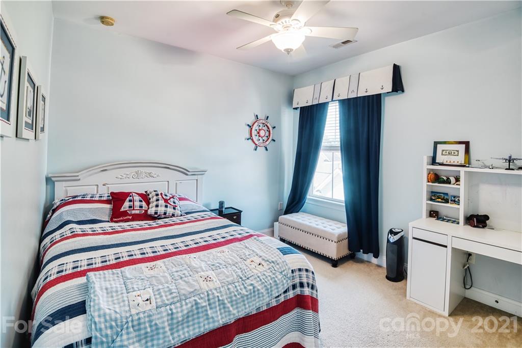 3349 Richard's Crossing Fort Mill, SC 29708 - Photo 26 of 33 a bedroom with a bed and a window