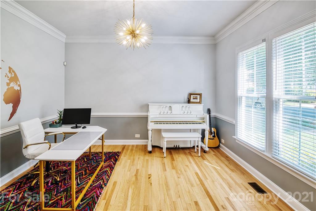 3349 Richard's Crossing Fort Mill, SC 29708 - Photo 6 of 33 a workspace with furniture and a chandelier