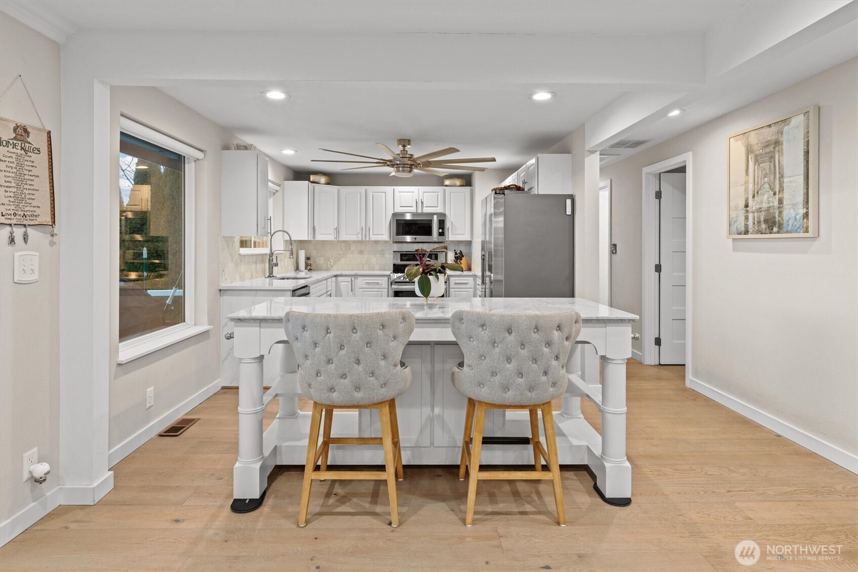 3415 Garden Avenue North Renton, WA 98056 - Photo 11 of 34 a dining room with furniture and window