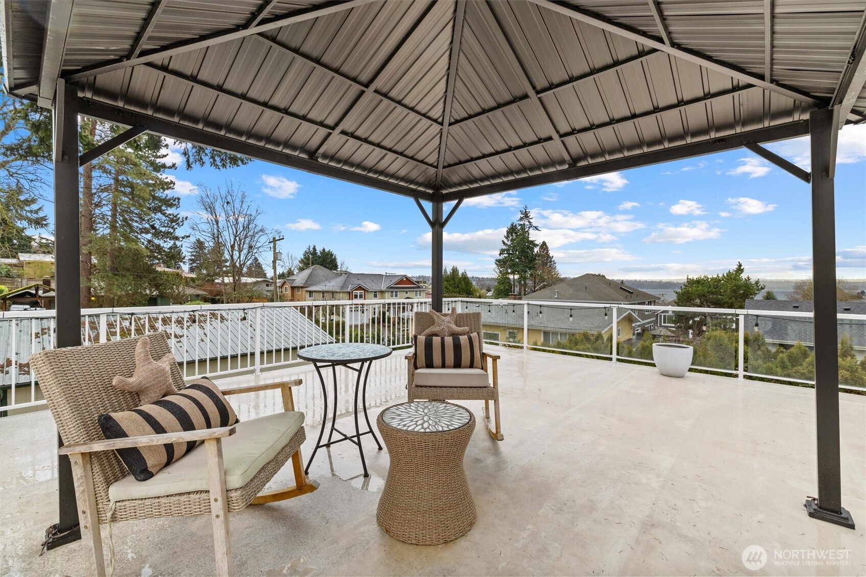 3415 Garden Avenue North Renton, WA 98056 - Photo 15 of 34 a view of a chairs and table in the balcony
