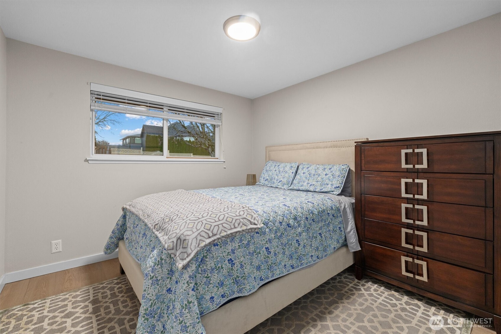 3415 Garden Avenue North Renton, WA 98056 - Photo 20 of 34 a bedroom with a bed and a window