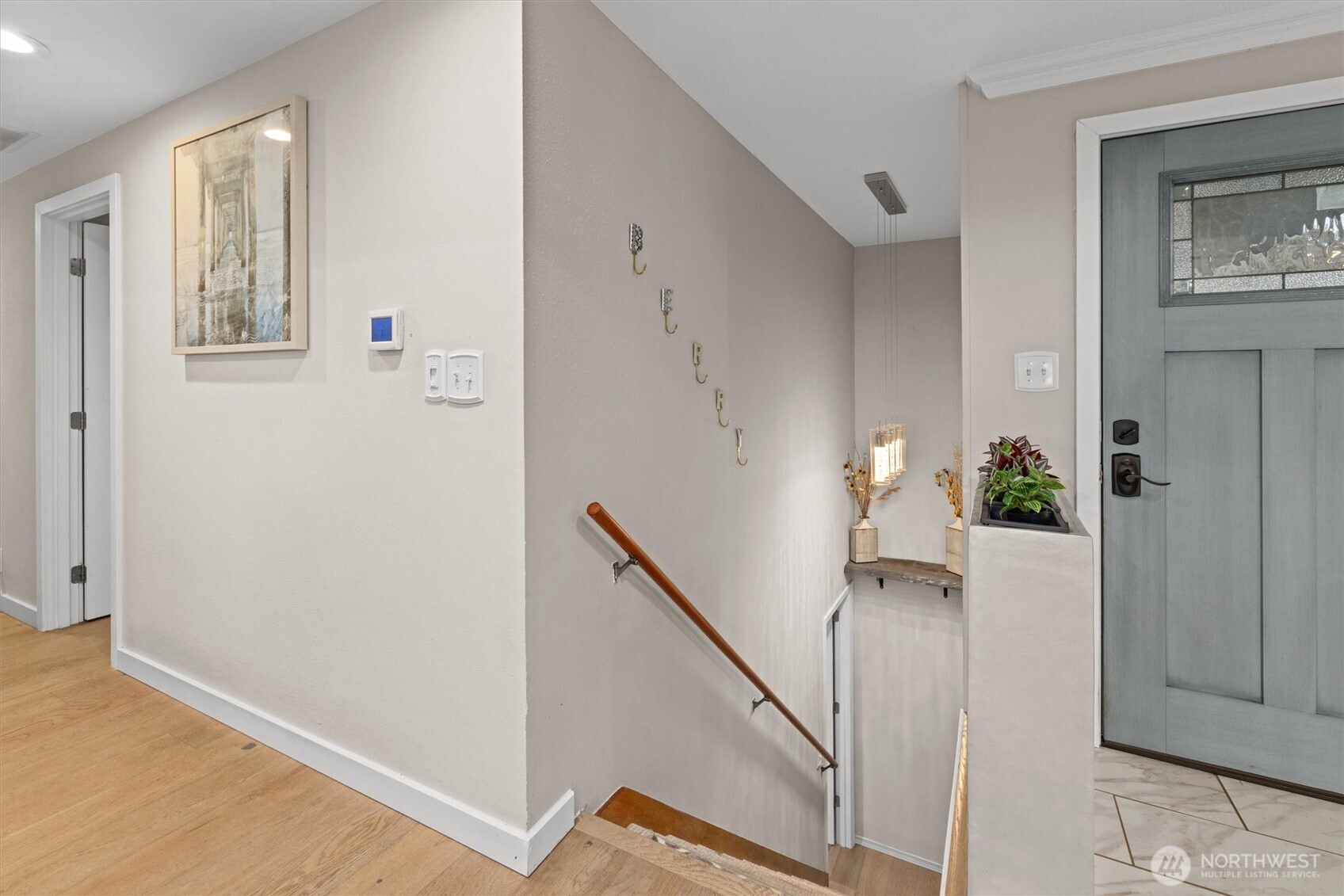 3415 Garden Avenue North Renton, WA 98056 - Photo 21 of 34 a view of an entryway with wooden floor