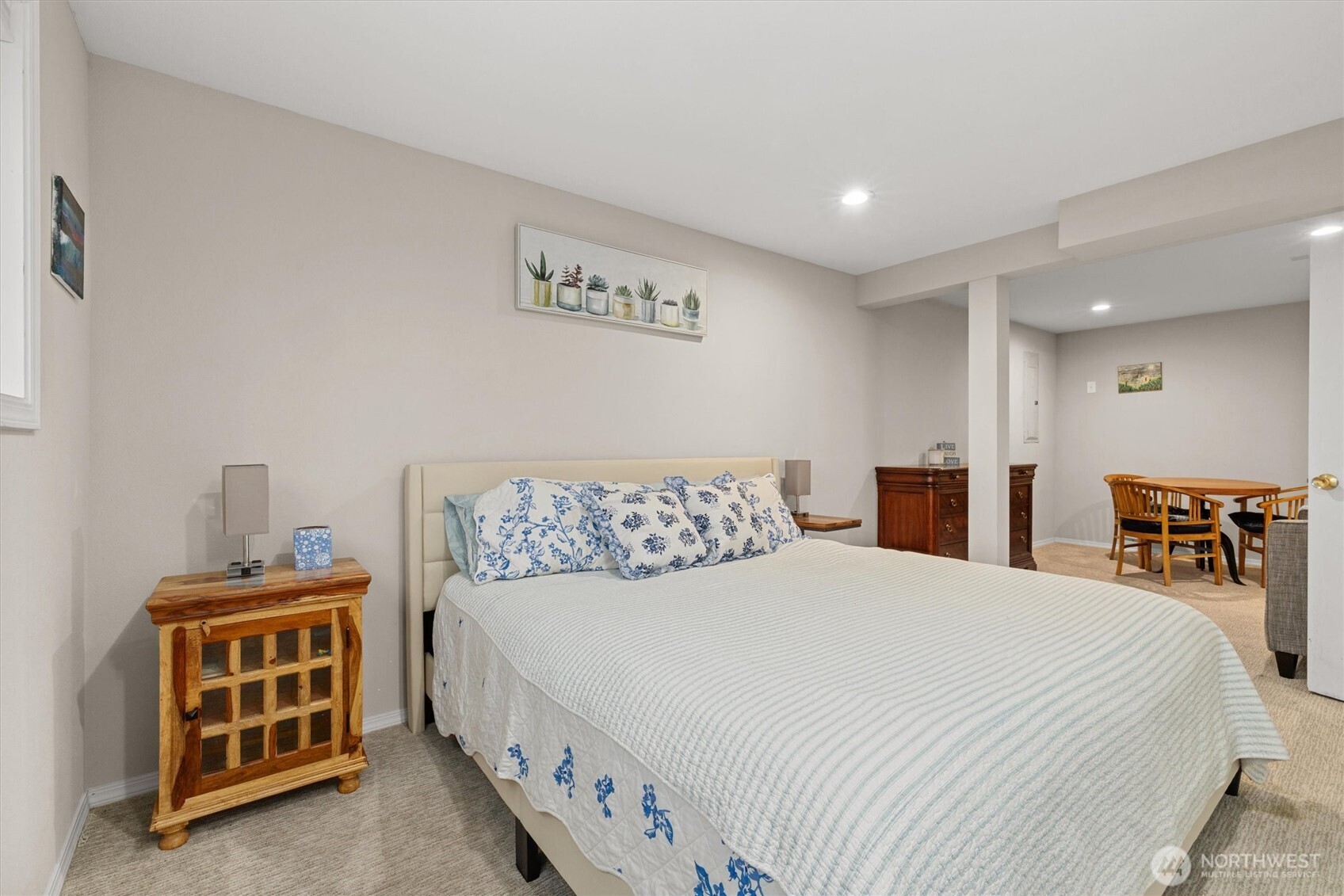 3415 Garden Avenue North Renton, WA 98056 - Photo 25 of 34 a bedroom with double bed and a table