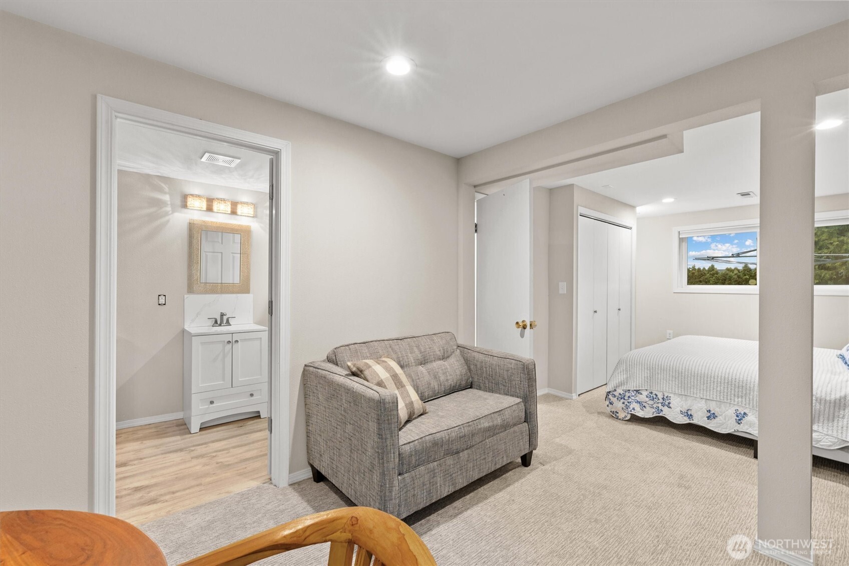 3415 Garden Avenue North Renton, WA 98056 - Photo 26 of 34 a living room with furniture and a walk in closet