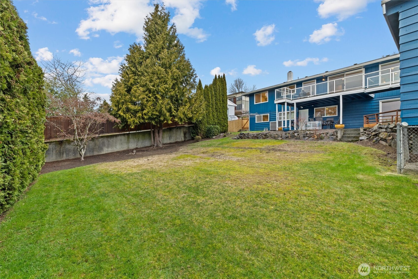 3415 Garden Avenue North Renton, WA 98056 - Photo 30 of 34 a view of a yard in front of a building