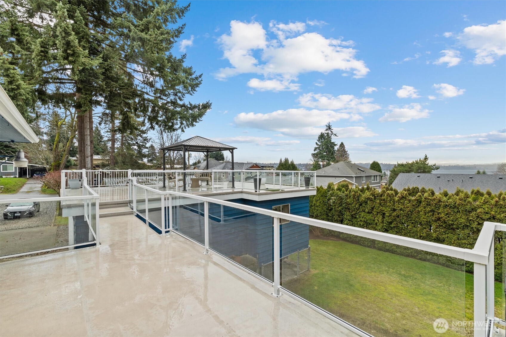 3415 Garden Avenue North Renton, WA 98056 - Photo 9 of 34 a view of a swimming pool with a lounge chair