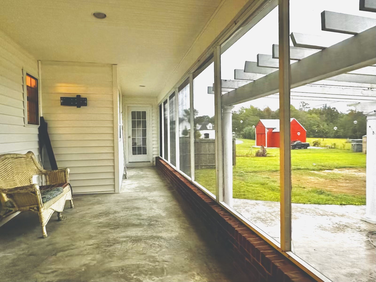 2668 Ragsdale Road Manchester, TN 37355 - Photo 5 of 32 a view of a porch with a table and chairs