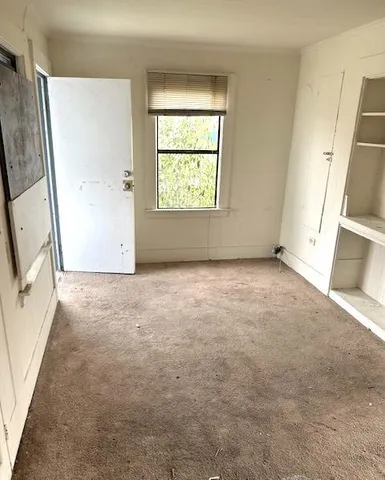 a kitchen with stainless steel appliances a sink and a refrigerator