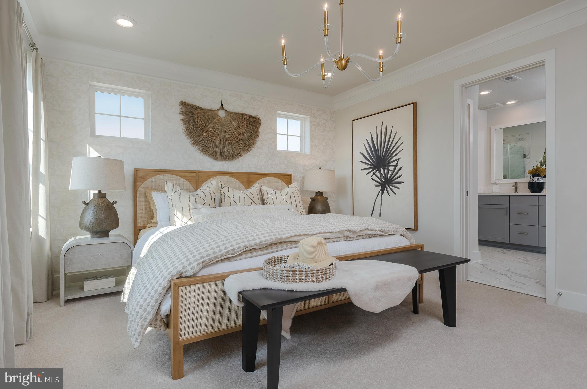 7708 Johnnycake Road Windsor Mill, MD 21244 - Photo 11 of 18 a bedroom with a bed and a chandelier