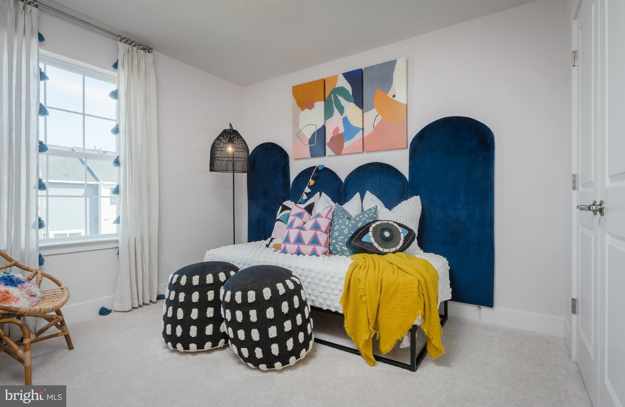 7708 Johnnycake Road Windsor Mill, MD 21244 - Photo 15 of 18 a bedroom with a bed and window